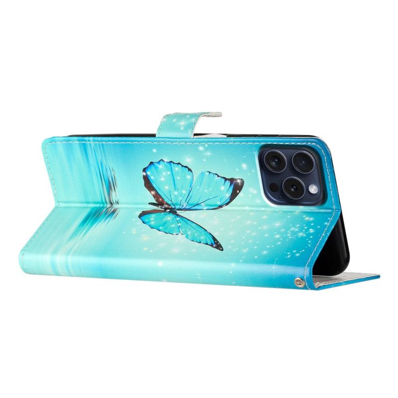 Lederhüllen iPhone 16 Pro Max Blauer Schmetterling Auf Dem Wasser Mit Riemen