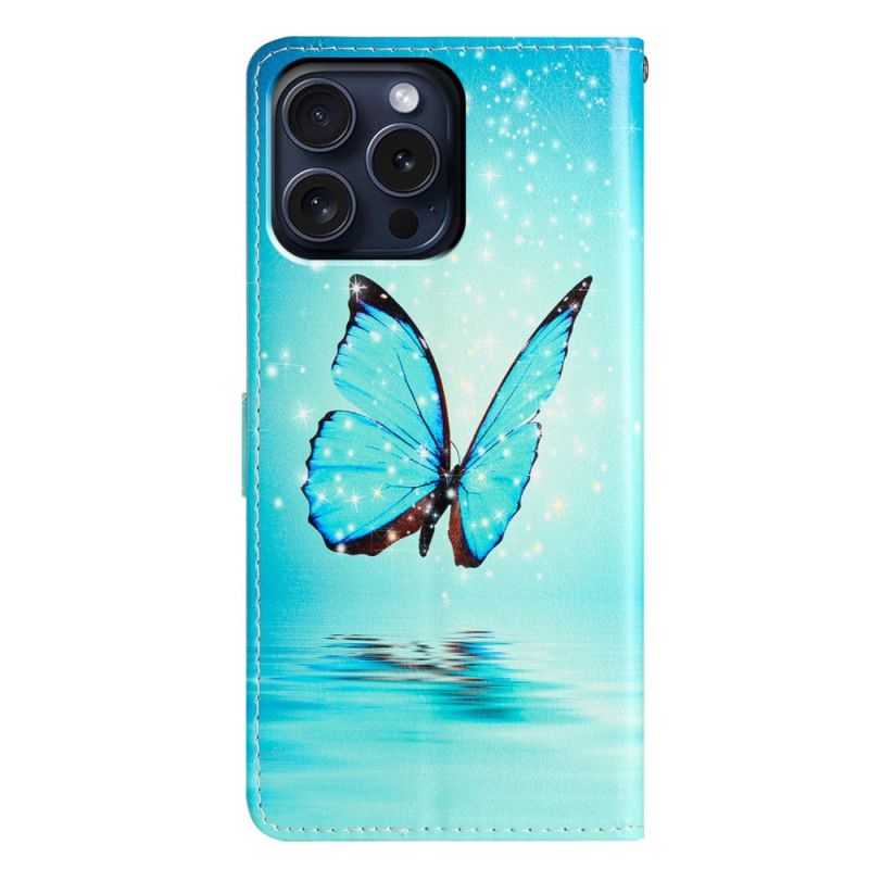 Lederhüllen iPhone 16 Pro Max Blauer Schmetterling Auf Dem Wasser Mit Riemen