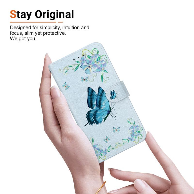 Lederhüllen iPhone 16 Pro Max Handyhülle Blauer Schmetterling Und Blumen Mit Riemen