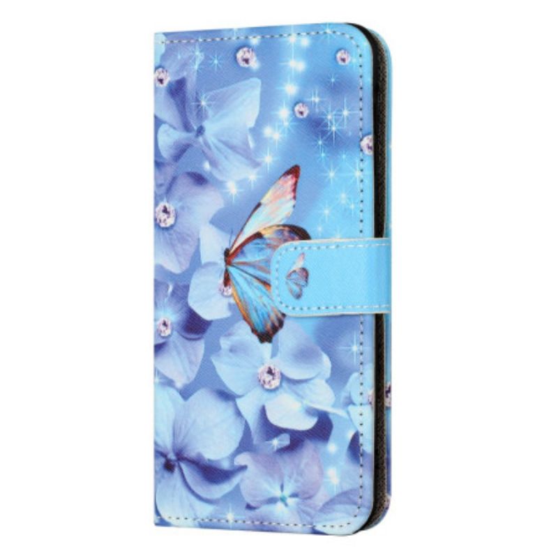 Lederhüllen Samsung Galaxy S24 Fe Blaue Blumen Und Schmetterlinge Mit Riemen