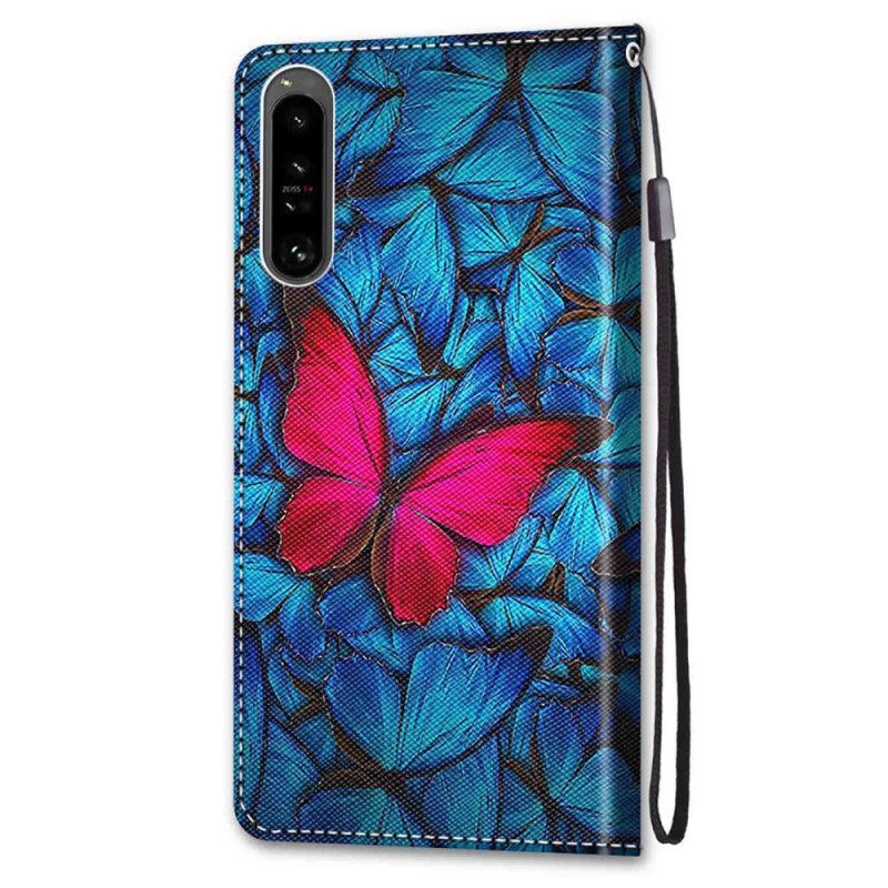 Flip Case Für Sony Xperia 1 IV Roter Schmetterling. Blauer Hintergrund