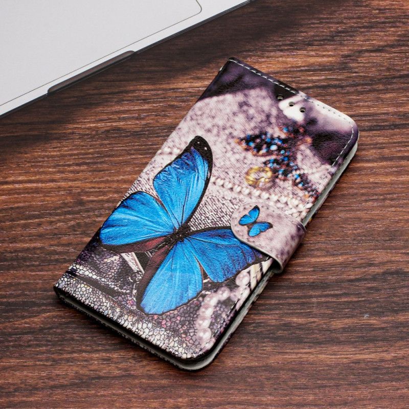 Lederhüllen Für iPhone 16 Blauer Schmetterling Mit Riemen