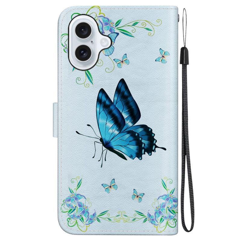 Lederhüllen iPhone 16 Blauer Schmetterling Und Blumen Mit Riemen