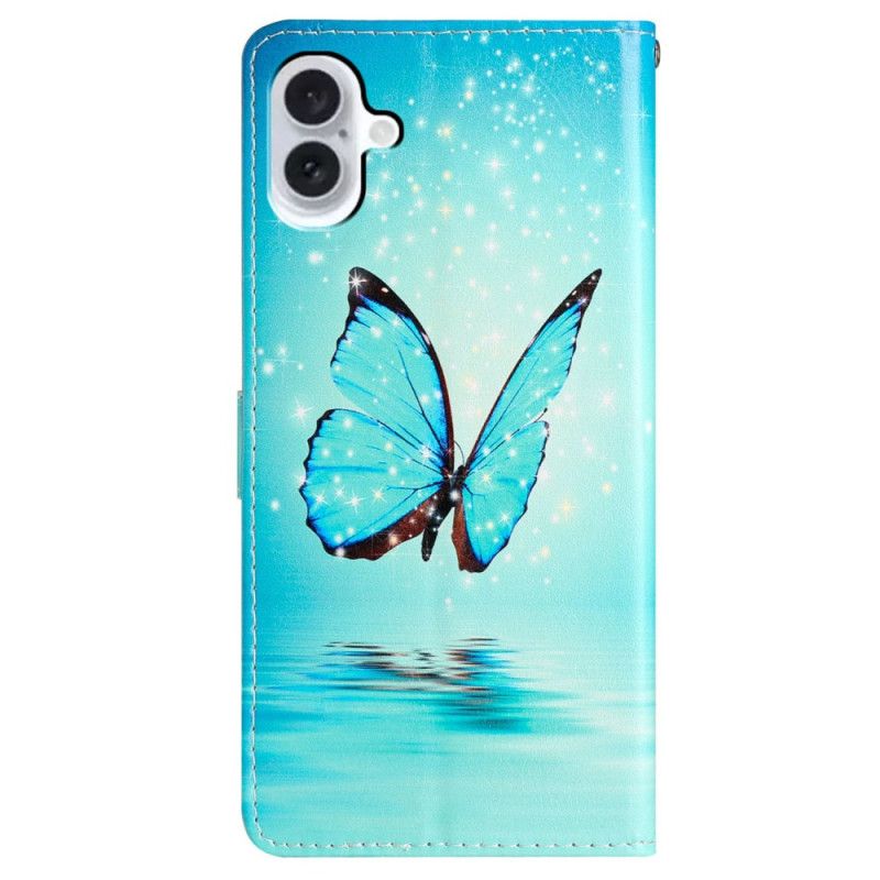 Lederhüllen iPhone 16 Handyhülle Blauer Schmetterling Mit Riemen