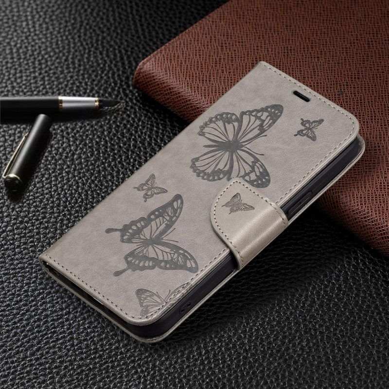 Flip Case Für Xiaomi 13 Pro Mit Kordel Riemchen Mit Schmetterlingen-print