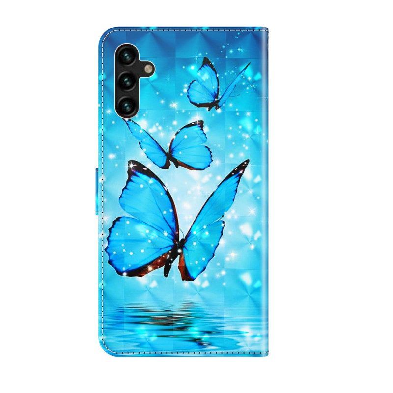 Lederhüllen Für Samsung Galaxy A13 5G / A04s Fliegende Blaue Schmetterlinge